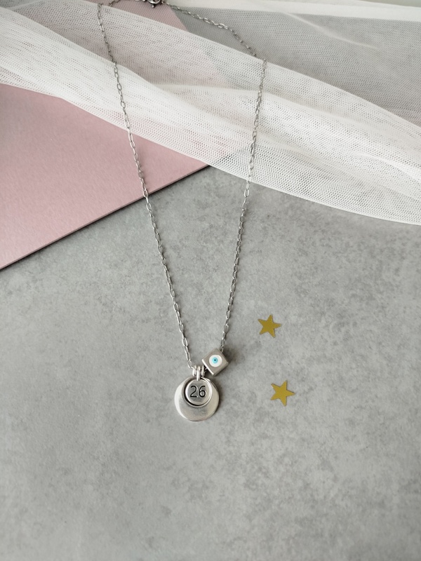 Κολιέ γούρι 2026 ασημί φλουρί και μάτι