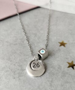 Κολιέ γούρι 2026 ασημί φλουρί και μάτι