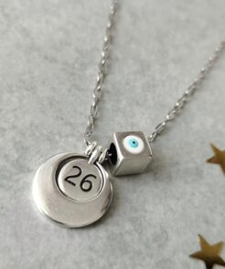 Κολιέ γούρι 2026 ασημί φλουρί και μάτι