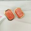 Σκουλαρίκια ατσάλινα Orange Love